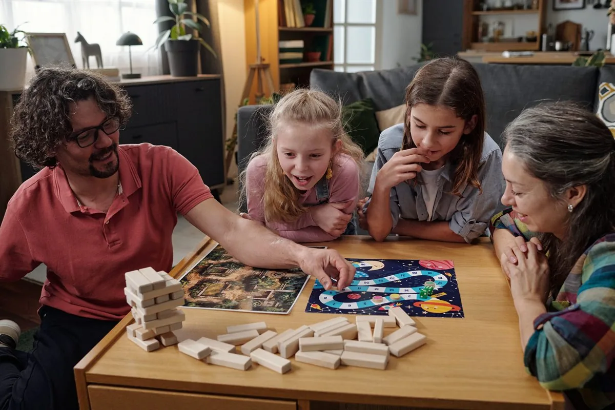 A family playing a board game together at home